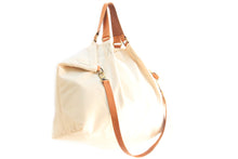 Load image into Gallery viewer, Weekend bag canvas and leather shoulder bag beige. Personalized bag with your name