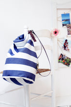 Load image into Gallery viewer, Cleo CONVERTIBLE BACKPACK in bag, canvas and leather backpack, Striped Blue color.