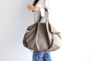 Susy Canvas and leather shoulder bag, made of water resistant canvas and leather