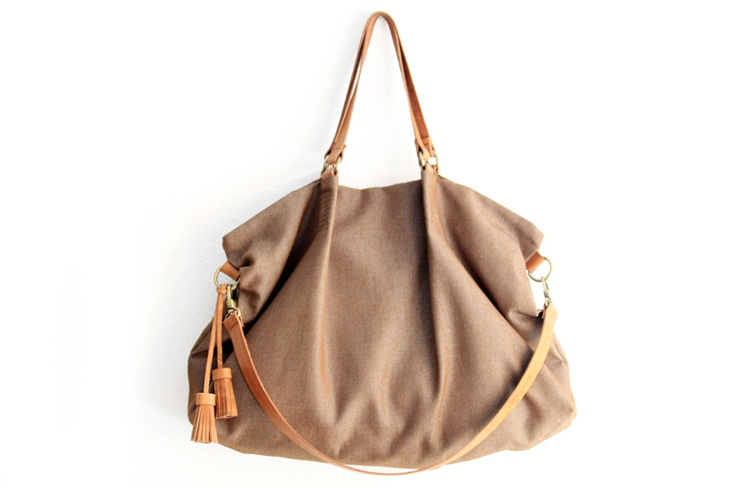 Canvas and leather shoulder bag, made of WATER RESISTANT fabric brown and leather. Susy shoulder bag
